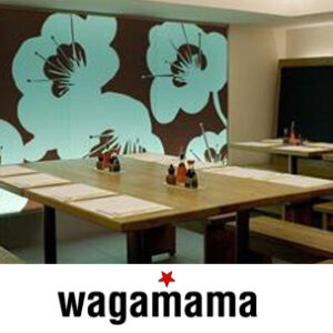 Restaurant branding Environmental graphic design Wagamama US debut AgencyBEL branding project Japanese-inspired decor Cherry blossom light wall Graphic printed shades Faneuil Hall restaurant Gensler collaboration Cultural brand adaptation